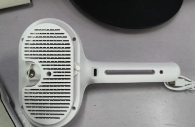 Self-Cleaning Mist-Enhanced Pet Grooming Comb